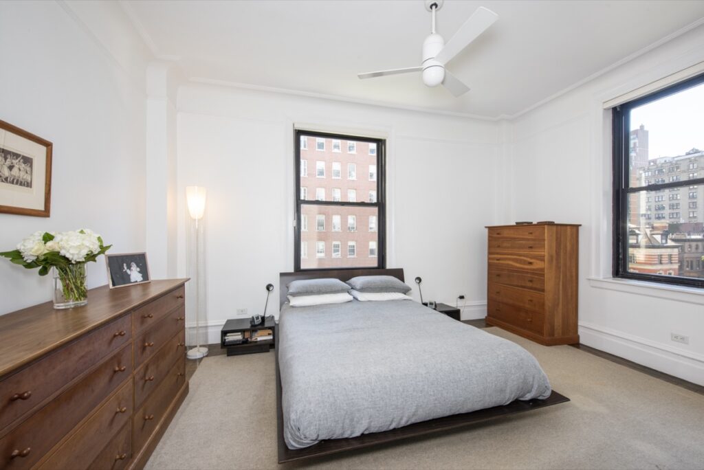 Bedroom with natural light in 645 W End Ave home, showcasing The Zweben Team's expertise in NYC real estate.
