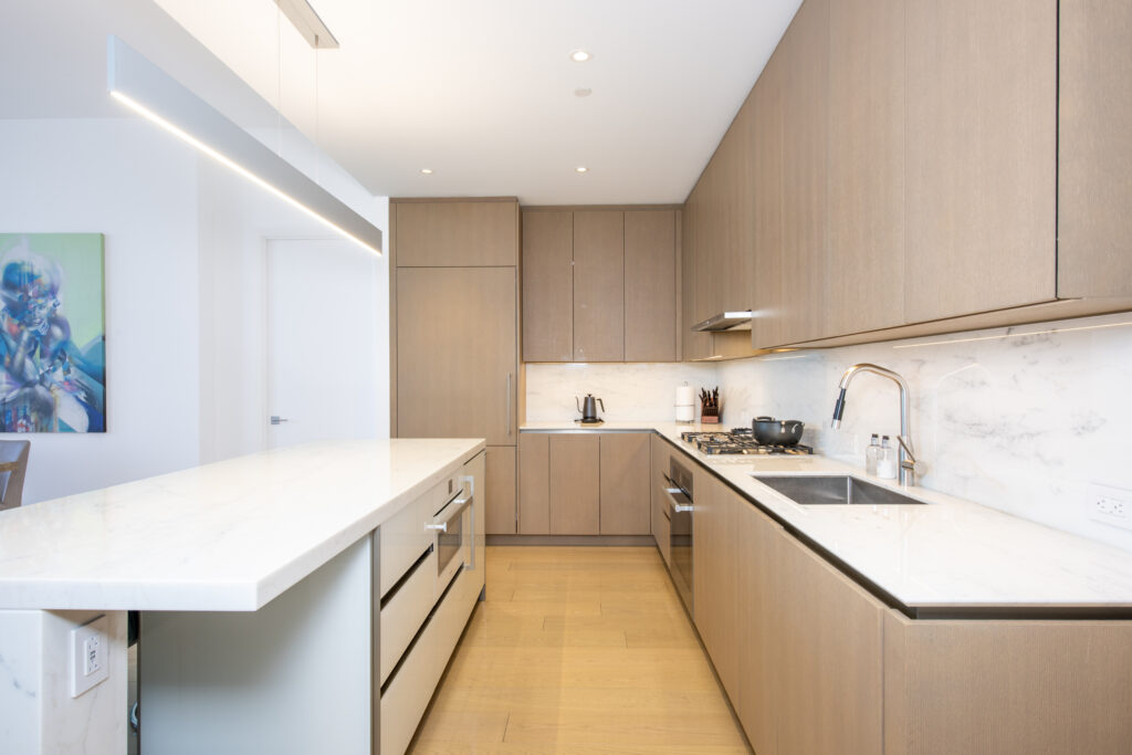 Gourmet kitchen with modern renovations in luxury NYC residence